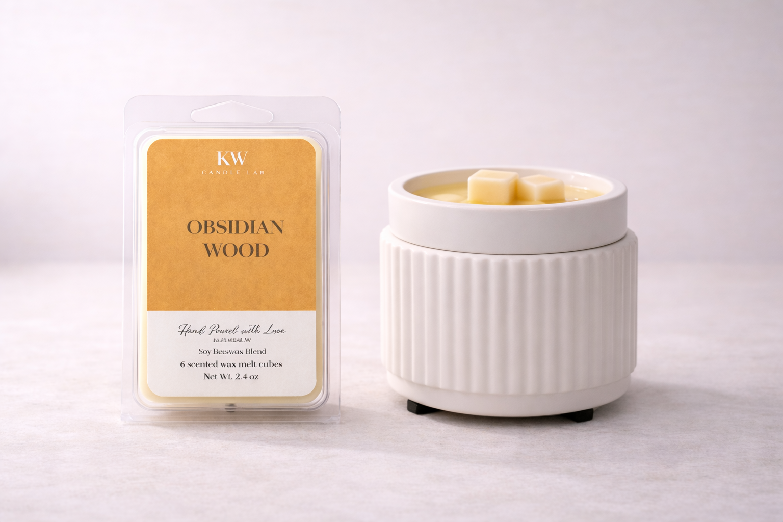 KW Candle Lab Obsidian Wood' smoky amber and Palo santo patchouli wax melts on a light gray background