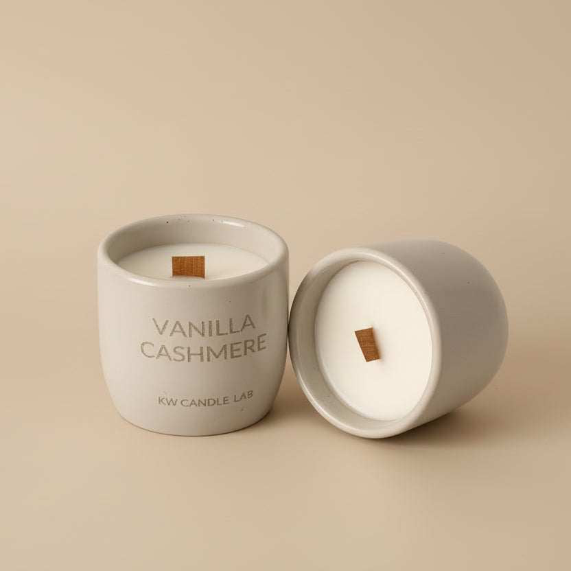 Vanilla Cashmere coconut soy candle featuring a crackling wood wick and hand-cast concrete vessel shown on a neutral background