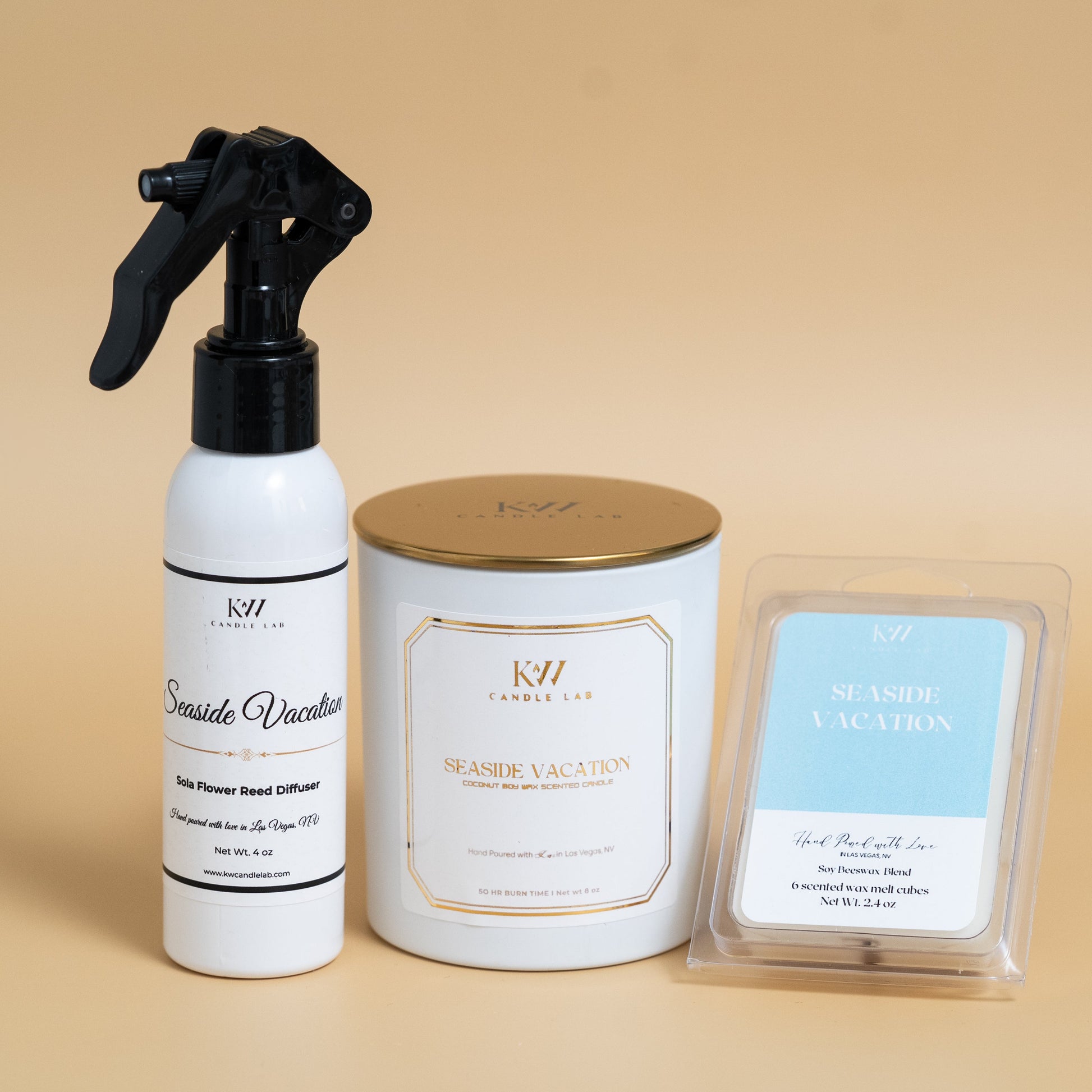 "Seaside Vacation fragrance collection featuring a wood wick candle, room spray, and scented wax melts by KW Candle Lab."
